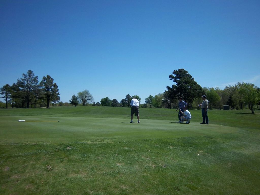 Foursome out plating golf